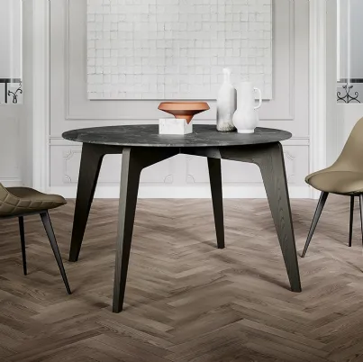 Tavolo rotondo Magic con top in laminato e gambe in massello di Frassino verniciato di Arredo3